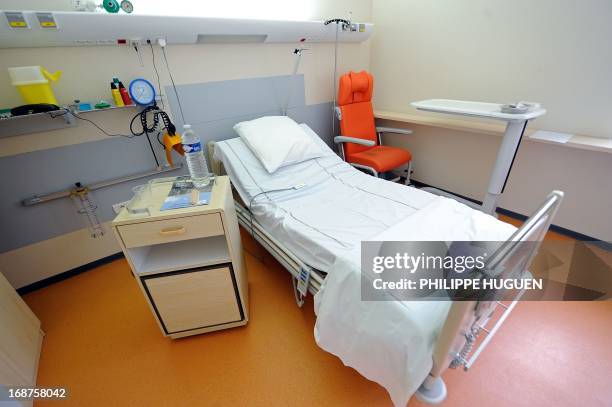 Picture taken on May 14, 2013 shows a room at the infectious diseases unit at the Tourcoing Hospital, northern France. The World Health Organisation...