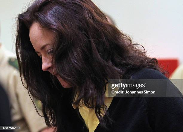 Defendant Beate Zschaepe arrives in the courtroom on day three of the NSU neo-Nazis murder trial at the Oberlandgericht Muenchen court on May 15,...