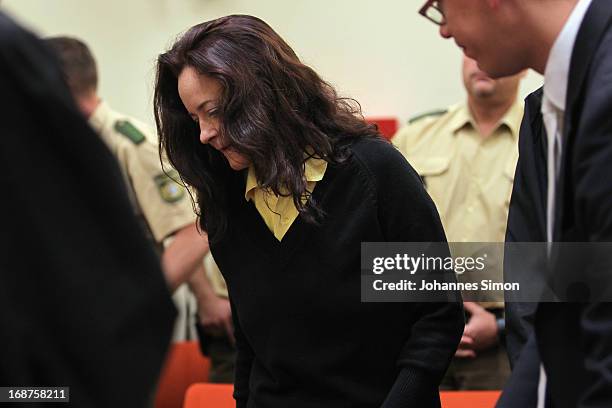 Defendant Beate Zschaepe arrives in the courtroom on day three of the NSU neo-Nazis murder trial at the Oberlandgericht Muenchen court on May 15,...