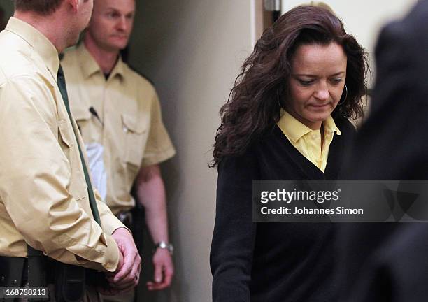 Defendant Beate Zschaepe arrives in the courtroom on day three of the NSU neo-Nazis murder trial at the Oberlandgericht Muenchen court on May 15,...