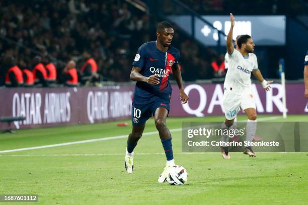 Ousmane Dembele of Paris Saint-Germain controls the ball during the Ligue 1 Uber Eats match between Paris Saint-Germain and Olympique de Marseille at...