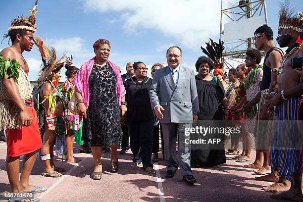 Papua New Guinea's Prime Minister Peter O'Neill arrives to participate in a national "haus krai" day of mourning in Port Moresby on May 15, 2013....
