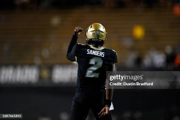 Quarterback Shedeur Sanders of the Colorado Buffaloes stands on the field before the start of a game against the Colorado State Rams at Folsom Field...