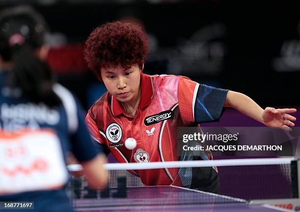 Taipei's Lin Chia-Hui returns a ball to USA's Ariel Hsing during the first round of the Women's Singles competition at the World Table Tennis...