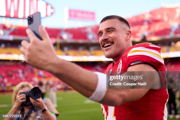 Travis Kelce of the Kansas City Chiefs celebrates after defeating the Chicago Bears at GEHA Field at Arrowhead Stadium on September 24, 2023 in...