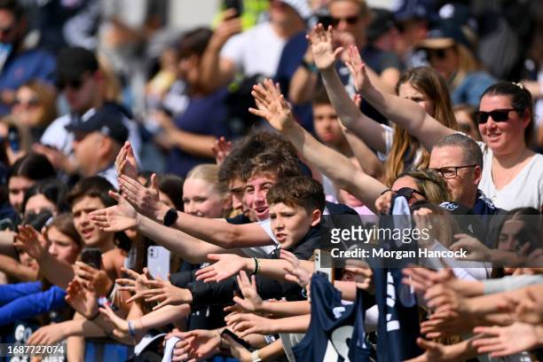 Fans show their support during a Carlton Blues AFL training session at Ikon Park on September 18, 2023 in Melbourne, Australia.