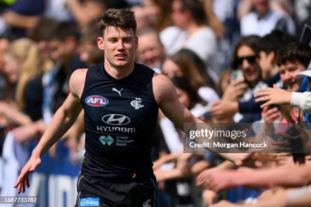 Sam Walsh of the Blues greets fans during a Carlton Blues AFL training session at Ikon Park on September 18, 2023 in Melbourne, Australia.