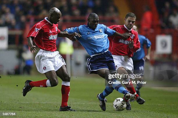 Shaun Goater of Manchester City battles with Richard Rufus and Luke Young of Charlton Athletic during the FA Barclaycard Premiership match between...