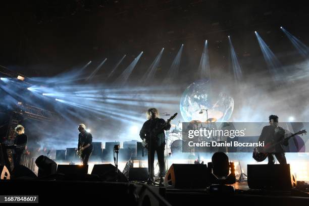 Perry Bamonte, Reeves Gabrels, Robert Smith, Jason Cooper and Simon Gallup of The Cure perform during Riot Fest 2023 at Douglass Park on September...