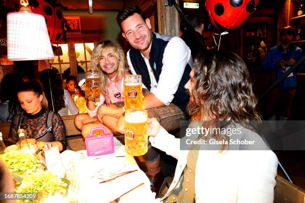 Bill Kaulitz, Marc Eggers and Tom Kaulitz during the 188th Oktoberfest at Käferzelt on September 24, 2023 in Munich, Germany.