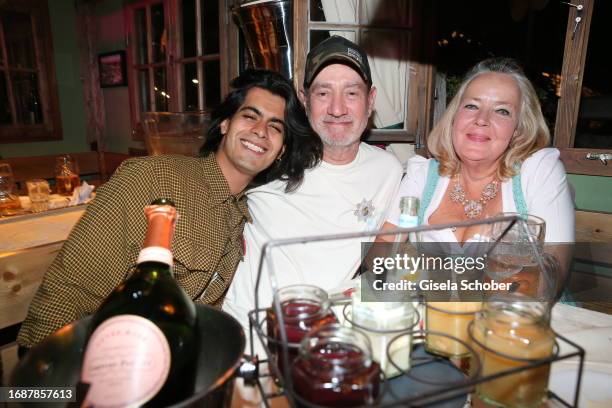 Omar de Soto, director Roland Emmerich and Gabriele Walther during the 188th Oktoberfest at Käferzelt on September 24, 2023 in Munich, Germany.