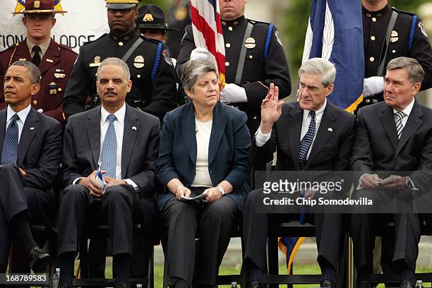 President Barack Obama, Attorney General Eric Holder, Homeland Security Secretary Janet Napolitano and FBI Director Robert Mueller attend the...