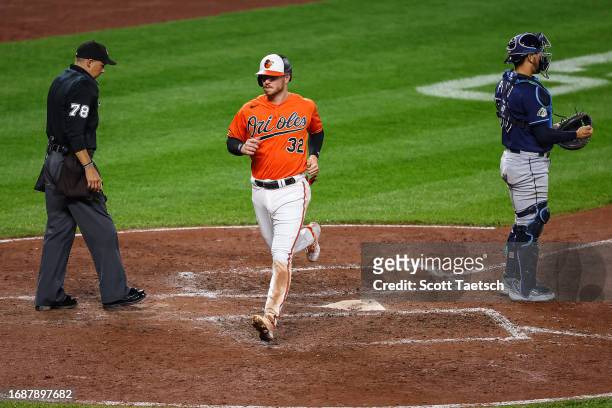 Ryan O'Hearn of the Baltimore Orioles scores a run against the Tampa Bay Rays during the fifth inning at Oriole Park at Camden Yards on September 16,...