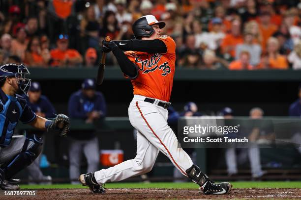 Adley Rutschman of the Baltimore Orioles at bat against the Tampa Bay Rays during the sixth inning at Oriole Park at Camden Yards on September 16,...