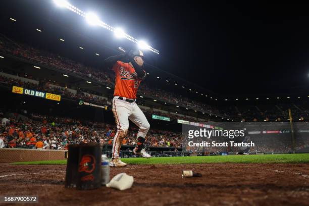 Ramon Urias of the Baltimore Orioles warms up against the Tampa Bay Rays during the eighth inning at Oriole Park at Camden Yards on September 16,...