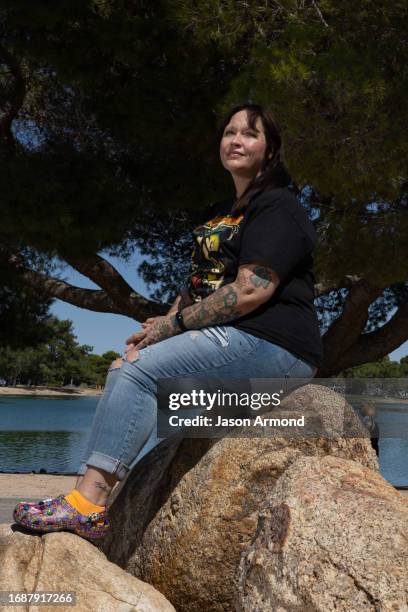 Lancaster, CA Christina Martin of Rosamond poses wearing Crocs her sister gave as a birthday gift on Saturday, Sept. 16, 2023 in Lancaster, CA.