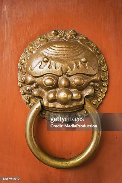 old dragon shaped door handle from china - shanghai temple stock pictures, royalty-free photos & images