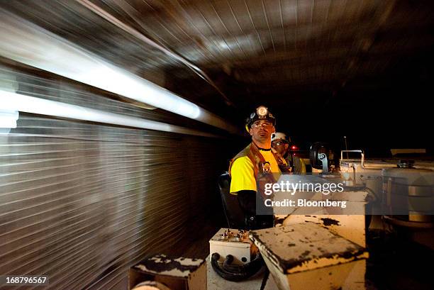 Driver transports coal in the longwall mining tunnel at the Consol Energy Bailey Mine in Wind Ridge, Pennsylvania, U.S., on Tuesday, May 14, 2013....