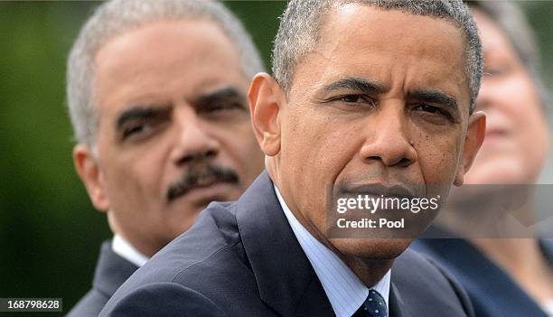 President Barack Obama, Attorney General Eric Holder and Secretary of Homeland Security Janet Napolitano look on during the 32nd annual National...