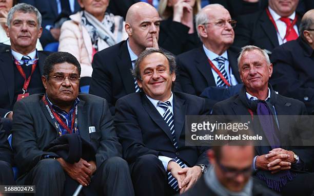Ex-Benfica footballer Eusebio, UEFA President Michel Platini and Ex-Ajax and Netherlands footballer Johan Cruyff share a joke during the UEFA Europa...