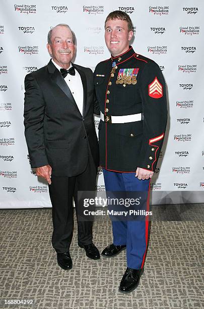 Rick Duree and Dakota Meyer arrive at the Long Beach Grand Prix Charity Ball on April 19, 2013 in Long Beach, California.