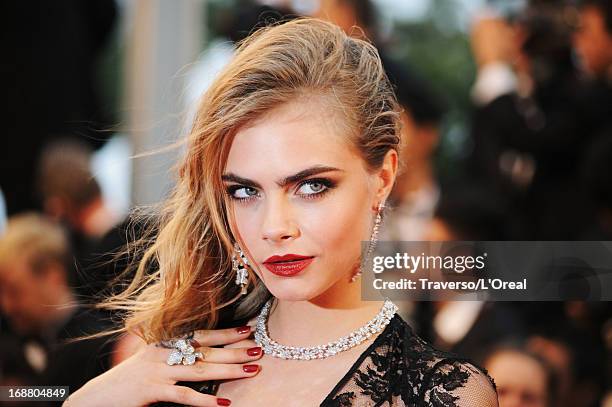 Model Cara Delevingne attends the Opening Ceremony and 'The Great Gatsby' Premiere during the 66th Annual Cannes Film Festival at the Theatre Lumiere...