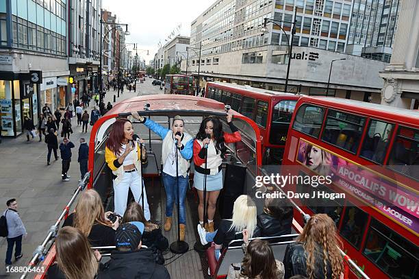 Alexandra Buggs, Karis Anderson and Courtney Rumbold of Stooshe pose on a London Bus to promote their new album 'London With The Lights On' on May...