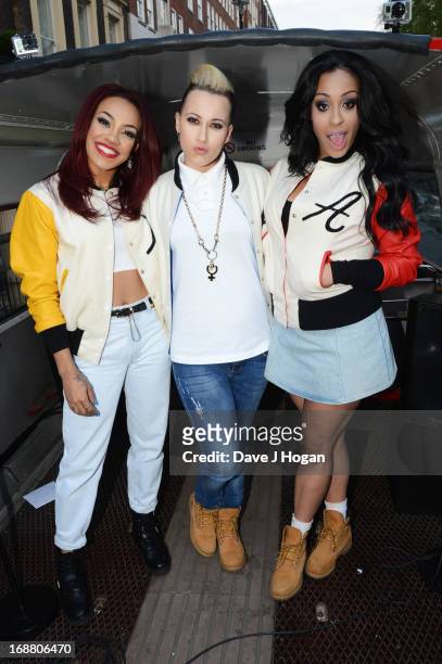 Alexandra Buggs, Karis Anderson and Courtney Rumbold of Stooshe pose on a London Bus to promote their new album 'London With The Lights On' on May...