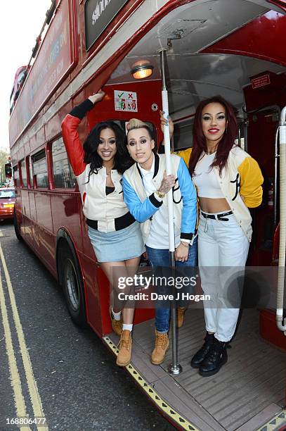 Alexandra Buggs, Karis Anderson and Courtney Rumbold of Stooshe pose on a London Bus to promote their new album 'London With The Lights On' on May...