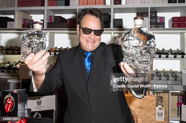 Dan Aykroyd displays his Crystal Head Vodka at Fauchon on May 15, 2013 in Paris, France.