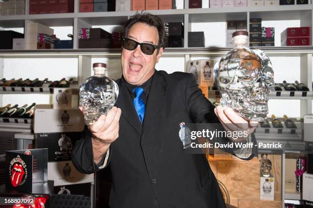 Dan Aykroyd displays his Crystal Head Vodka at Fauchon on May 15, 2013 in Paris, France.