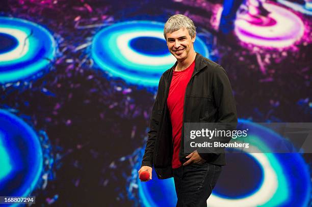 Larry Page, co-founder and chief executive officer at Google Inc., smiles while speaking at the Google I/O Annual Developers Conference in San...