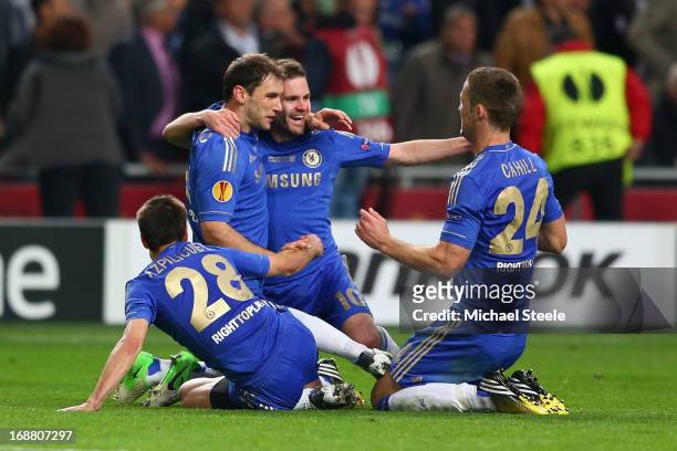 Branislav Ivanovic of Chelsea celebrates scoring their second and winning goal with Juan Mata, Gary Cahill and Cesar Azpilicueta of Chelsea during...