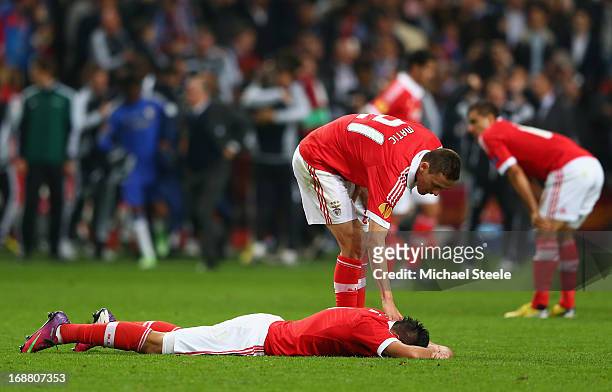 Nemanja Matic of Benfica consoles a dejected Oscar Cardozo of Benfica after defeat in the UEFA Europa League Final between SL Benfica and Chelsea FC...
