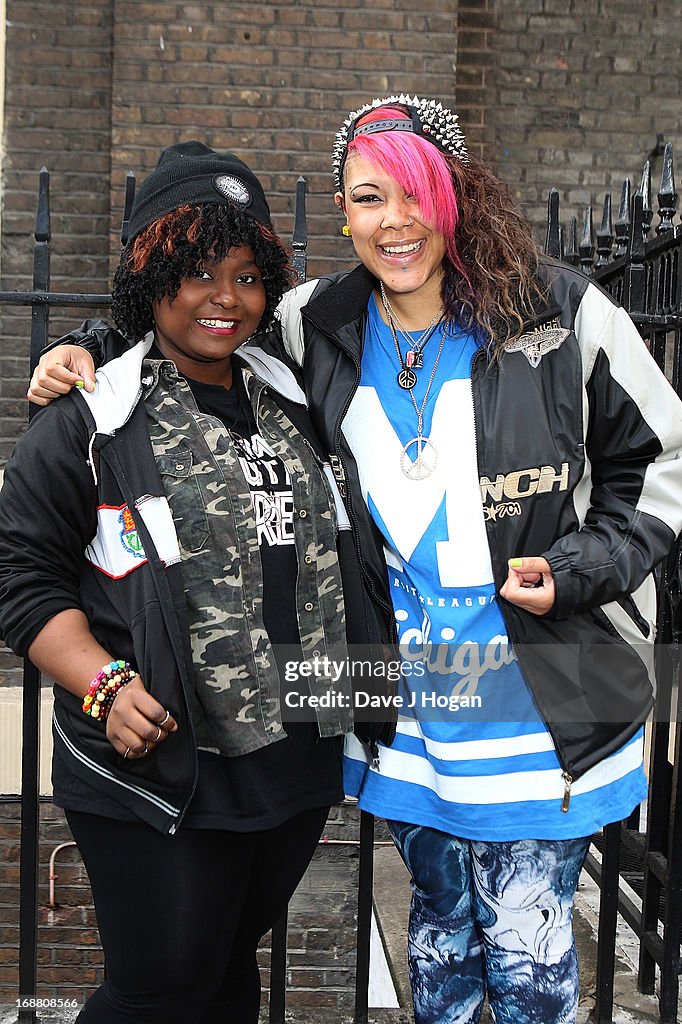 Stooshe fans watching their favourite band leave on a double decker ...