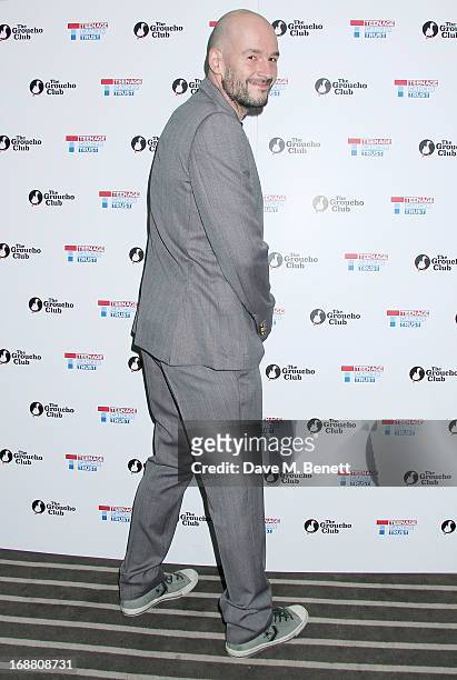Jake Chapman arrives at the annual fundraising art auction in aid of Teenage Cancer Trust at The Groucho Club on May 15, 2013 in London, England.
