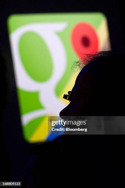 The silhouette of an attendee wearing Google Project Glass is seen at the Google I/O Annual Developers Conference in San Francisco, California, U.S.,...