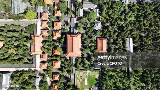 Aerial photo taken on Sept 22, 2023 shows the ancient building group of three holes in Qufu, the hometown of Confucius, in Jining, Shandong Province,...