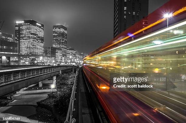train in motion at night - isolated colour stockfoto's en -beelden