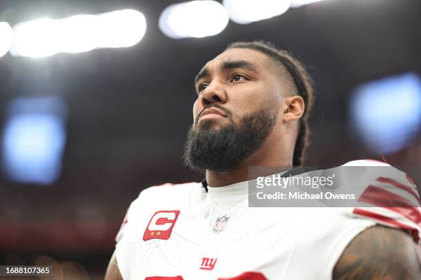 Leonard Williams of the New York Giants looks on during the national anthem prior to an NFL football game between the Arizona Cardinals and the New...