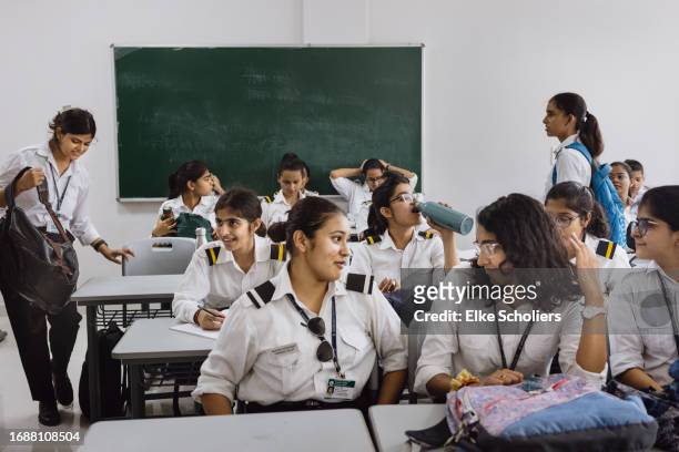 Pilot students prepare for a course at Banasthali University on September 15, 2023 in Jaipur, India. Despite a declining female labor participation...