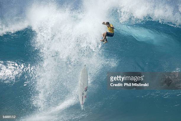 Professional surfer Rodrigo Dornelles of Brazile wipes out during the filming of WB network's reality TV show "North Shore" December 14, 2002 in...