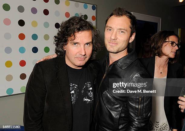 Ant Genn and Jude Law attend the annual fundraising art auction in aid of Teenage Cancer Trust at The Groucho Club on May 15, 2013 in London, England.