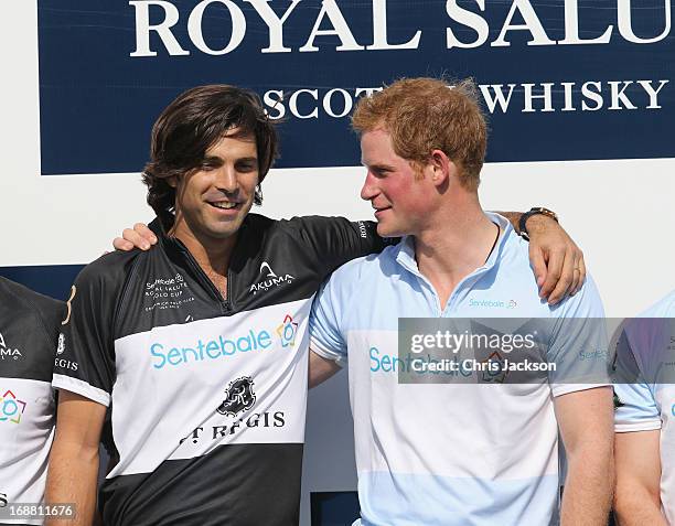 Polo Player Nacho Figueras and Prince Harry pose together at the Greenwich Polo Club during the sixth day of HRH Prince Harry's visit to the United...