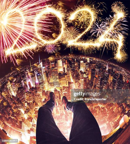 watching the new year 2024 fireworks - happy new year 2016 stock pictures, royalty-free photos & images