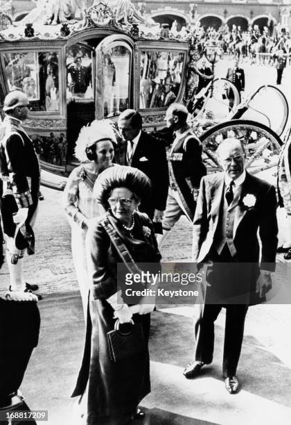 Queen Juliana accompanied by Prince Bernhard of the Netherlands, followed by Princess Beatrix of the Netherlands and her husband Prince Claus of the...