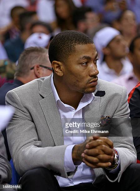 Derrick Rose of the Chicago Bulls looks on during Game Five of the Eastern Conference Semifinals of the 2013 NBA Playoffs against the Miami Heat at...
