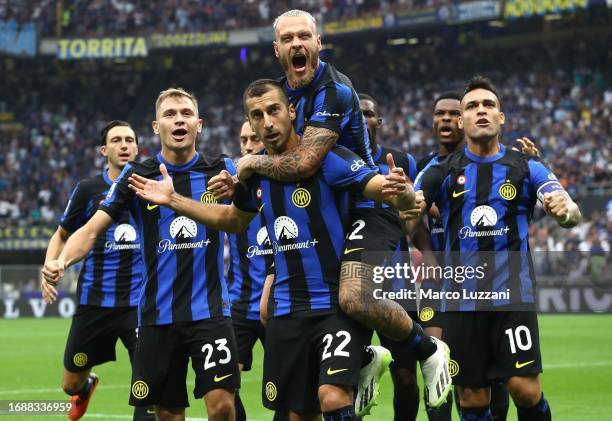 Henrikh Mkhitaryan of FC Internazionale celebrates with his team-mates after scoring the opening goal during the Serie A TIM match between FC...