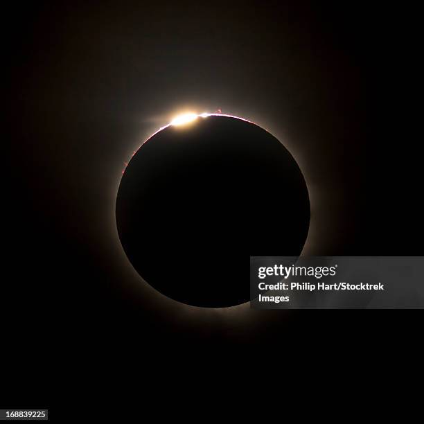 solar eclipse with prominences and diamond ring effect, queensland, australia. - bailys beads stock pictures, royalty-free photos & images