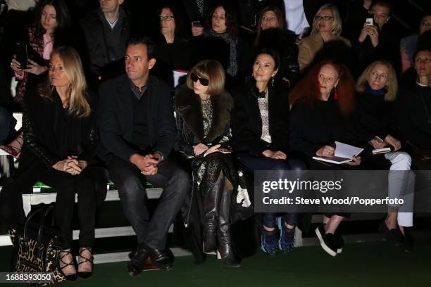 United States Ambassador to France Jane D. Hartley, Anna Wintour, Wendi Deng and Grace Coddington sit front row at the Celine show during Paris...